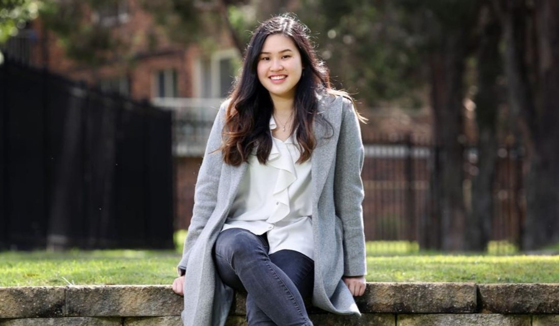 Young woman sitting in the park